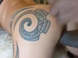 tattooed black pecker