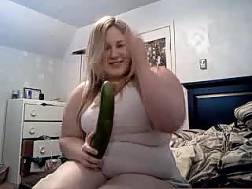 girl big cucumber tries