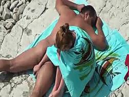 couple caught beach