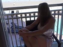 lighthaired spreading legs balcony