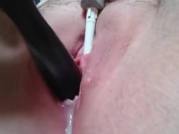 close-up toy penetrating vagina