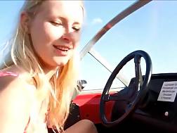 blond driving outdoors