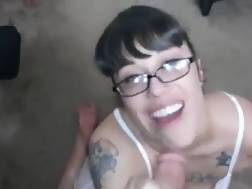 geeky chick blowing penis