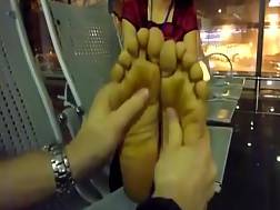 asian couple foot massage