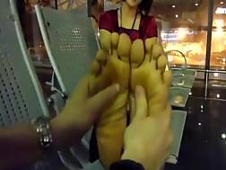 asian couple foot massage