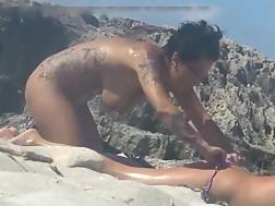 nudist touching beach