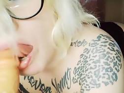 tattooed lighthaired blowjob penis