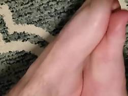 fondling feet hairy legs