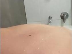 wife playing herself bath