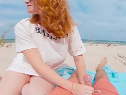 ginger redhaired public beach