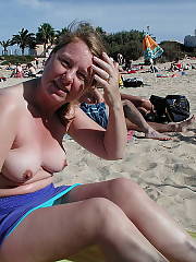 mother showing body beach